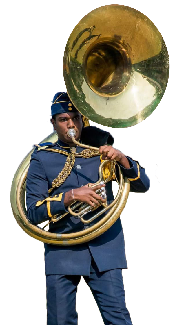 A Royal cadet member blowing the Tuba