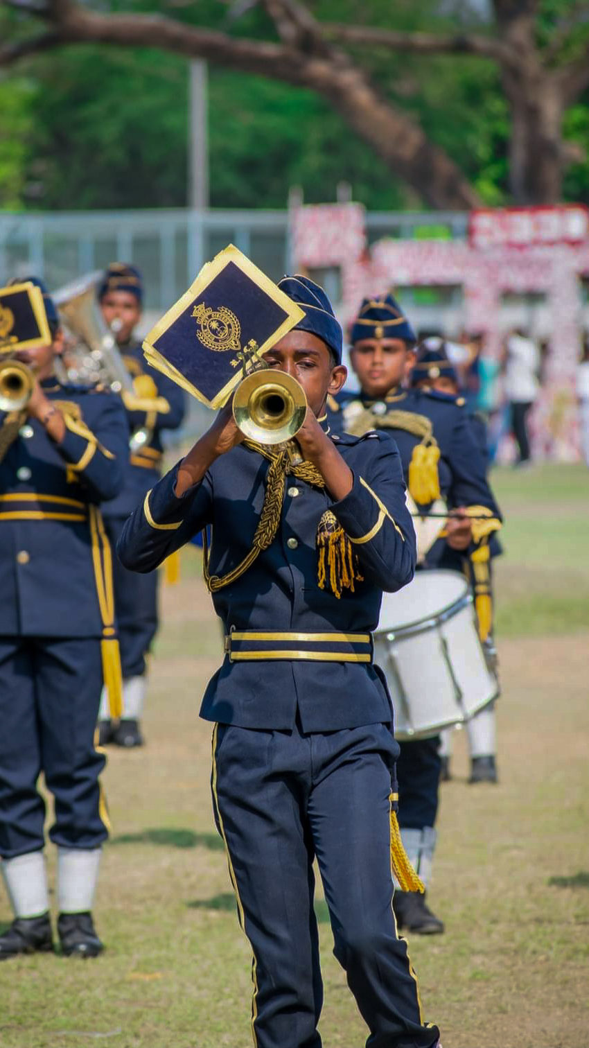 Royal College Cadet playing the trumpet